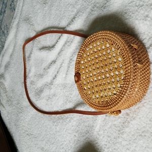 Daisy hand woven circle Rattan bag.